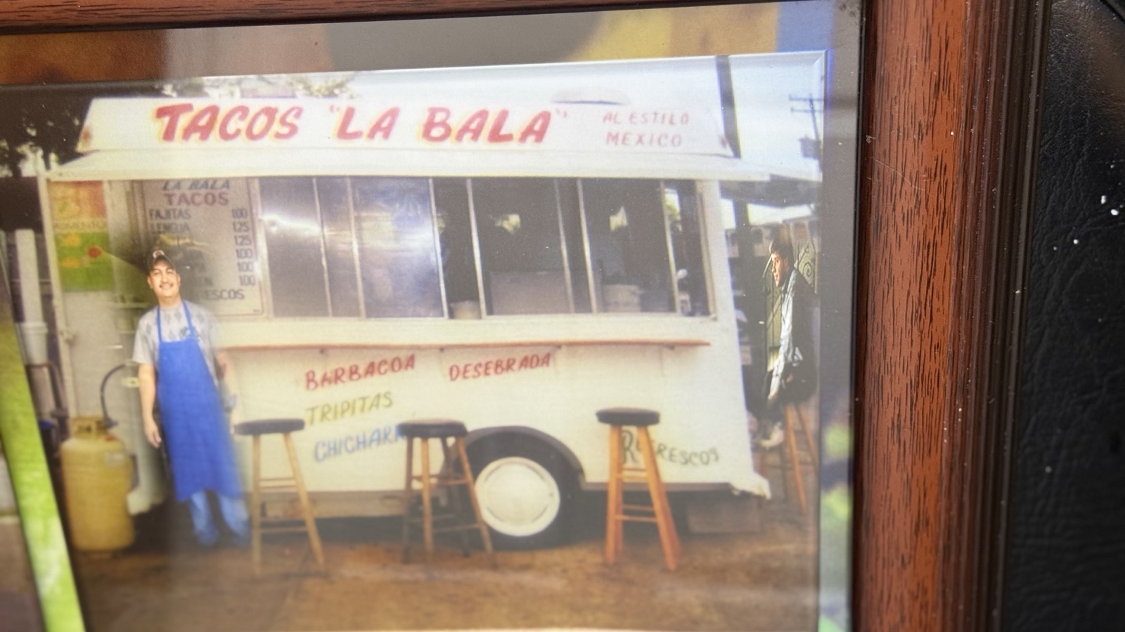 The original Tacos La Bala trailer with the name hand-painted across the top